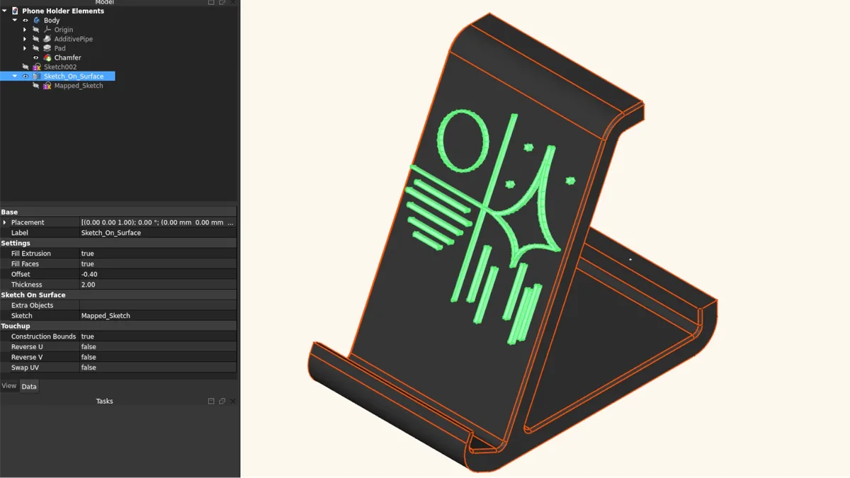 Vector design extruded into surface on phone stand
