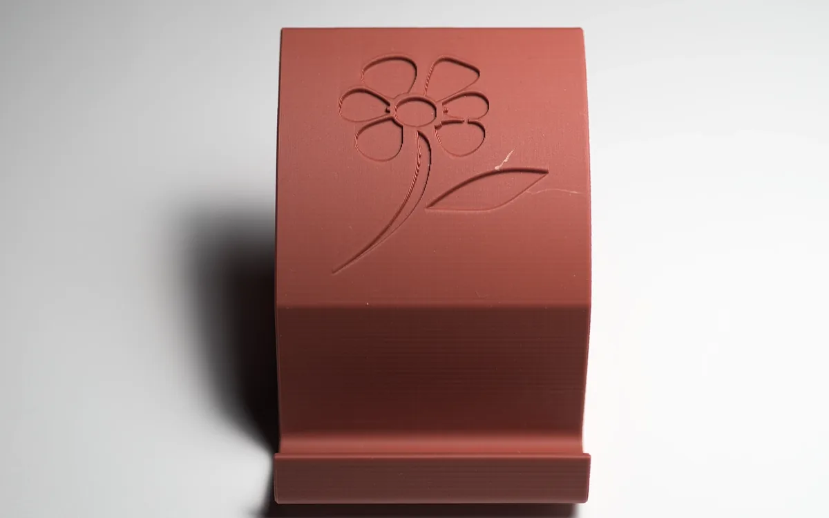 Flower vector design on phone stand imported from Inkscape as DXF